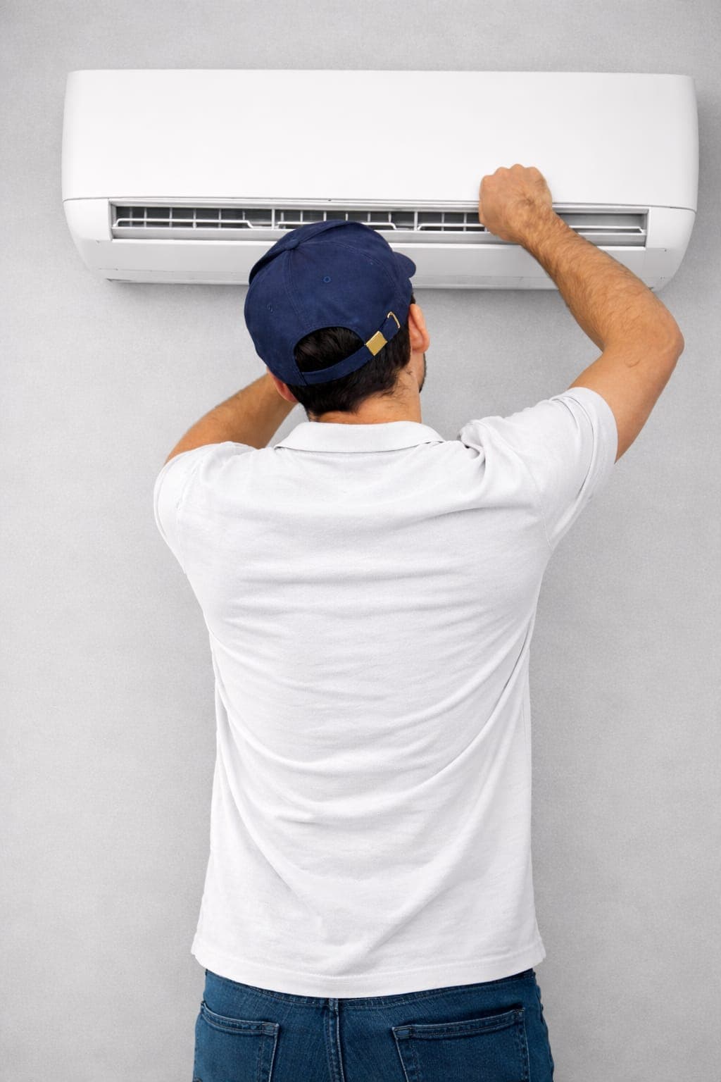 AC service technician at work